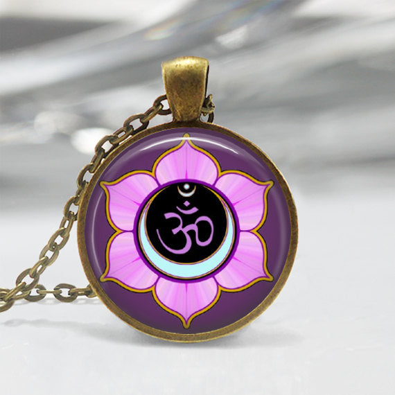 Om Symbol Necklace - free shipping throughout North America, please allow 15-21 days.