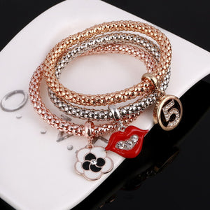 New! 3 Bracelets with Bangles - Free Shipping Anywhere In North America. Please allow 2-4 weeks for delivery